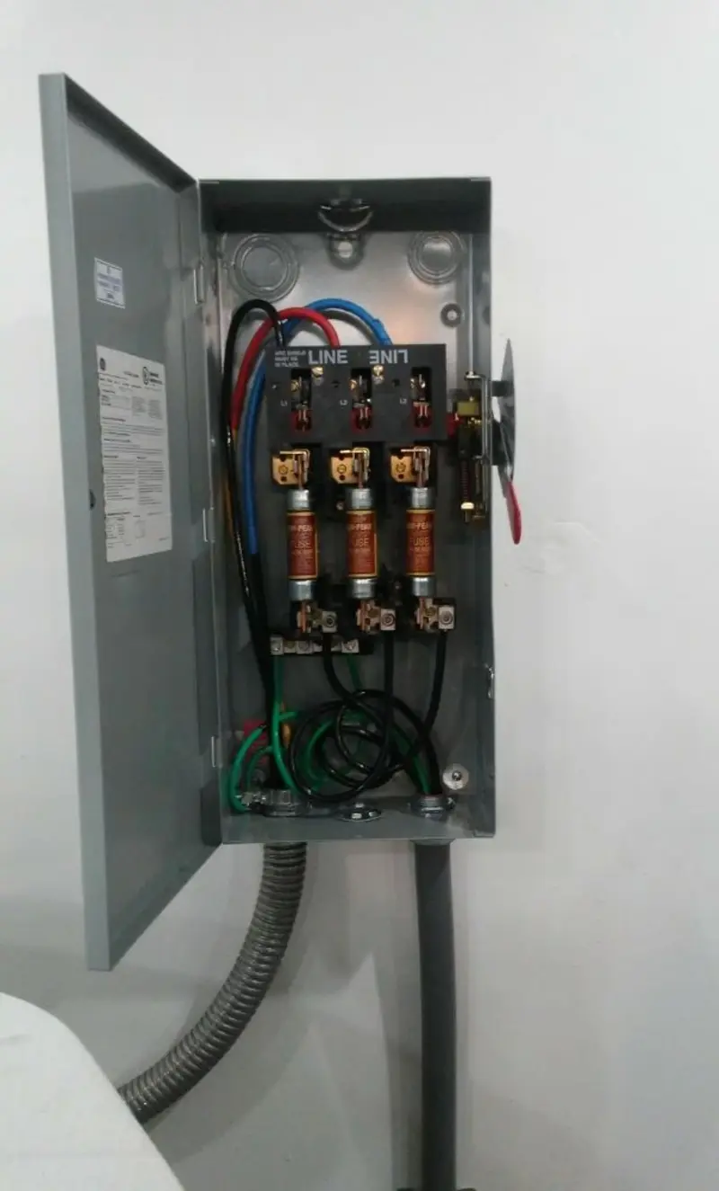 Three-phase disconnect switch installed for Smoke Detector Installation in Rindge